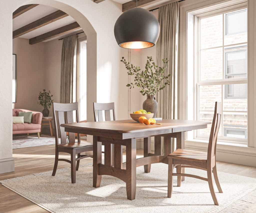 Dining room with Amish wooden table and chairs, featuring a large window, modern pendant light, and a vase with greenery.