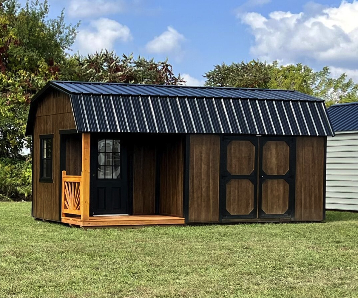 Barn-style shed with porch showing flexible shed sizes for backyard retreats or hobby spaces.